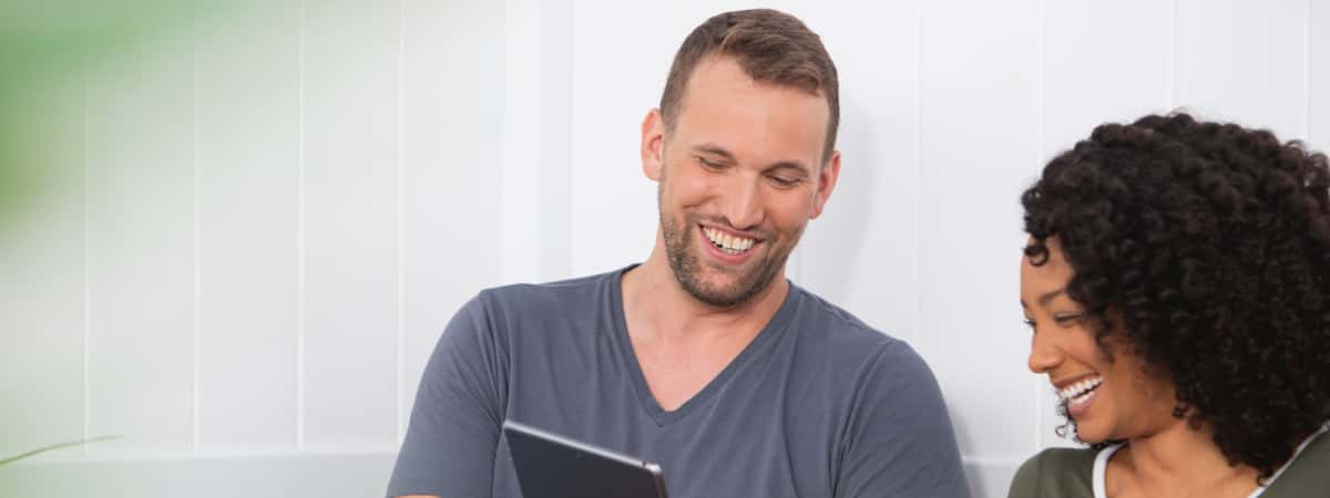 People looking at a tablet